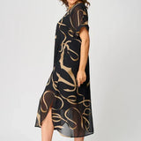 Airy Dress with Linear Designs and V Neckline